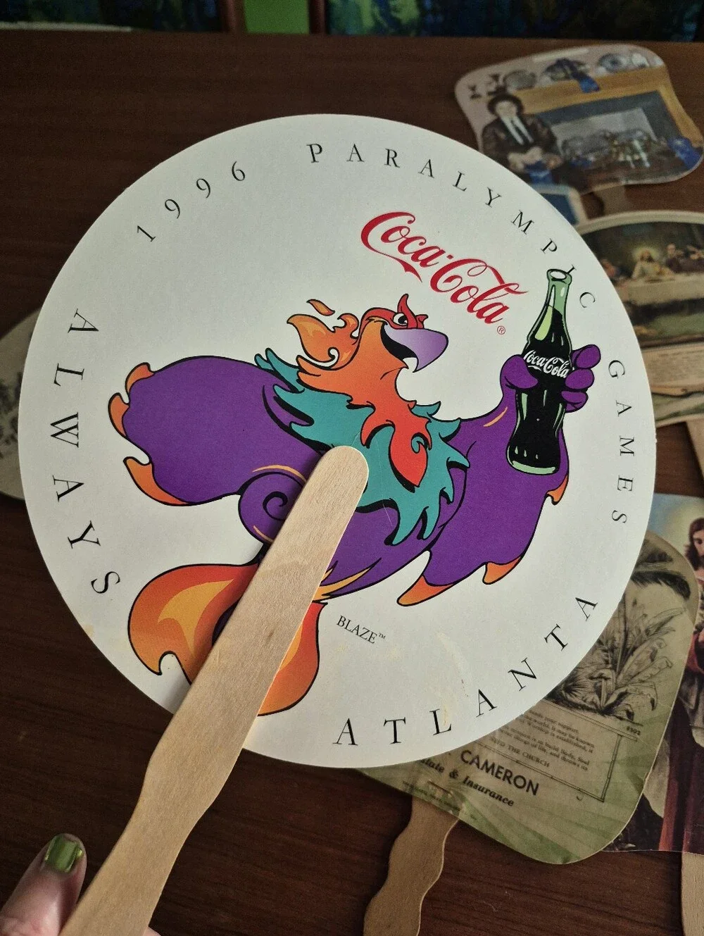 Assorted vintage advertising fans